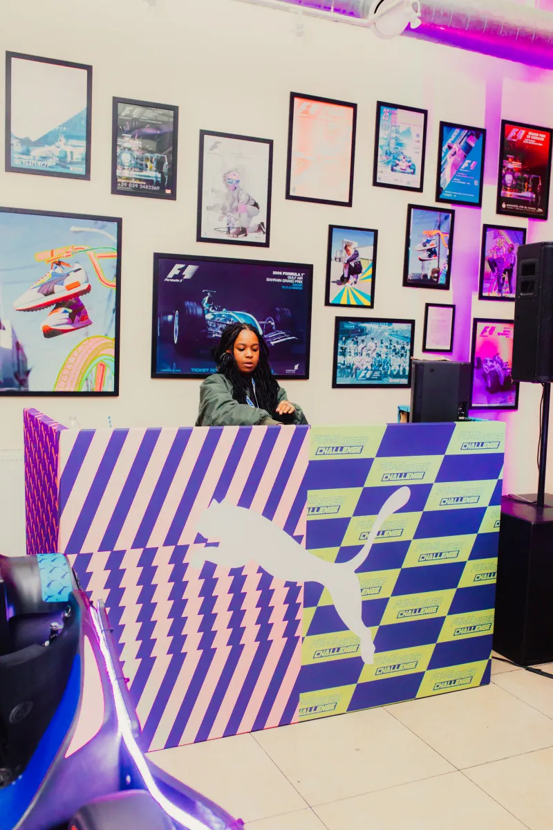 A DJ booth on the PUMA check-pattern set