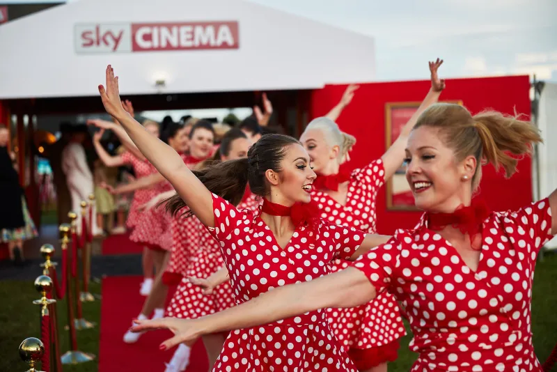 Dancers in red polka dots for Sky Cinema at the Goodwood Revival